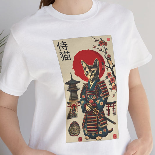 Person wearing a white t-shirt with a cat in a kimono design, standing indoors.