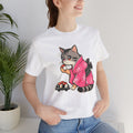 Person wearing a white t-shirt with a cat in a kimono graphic design.