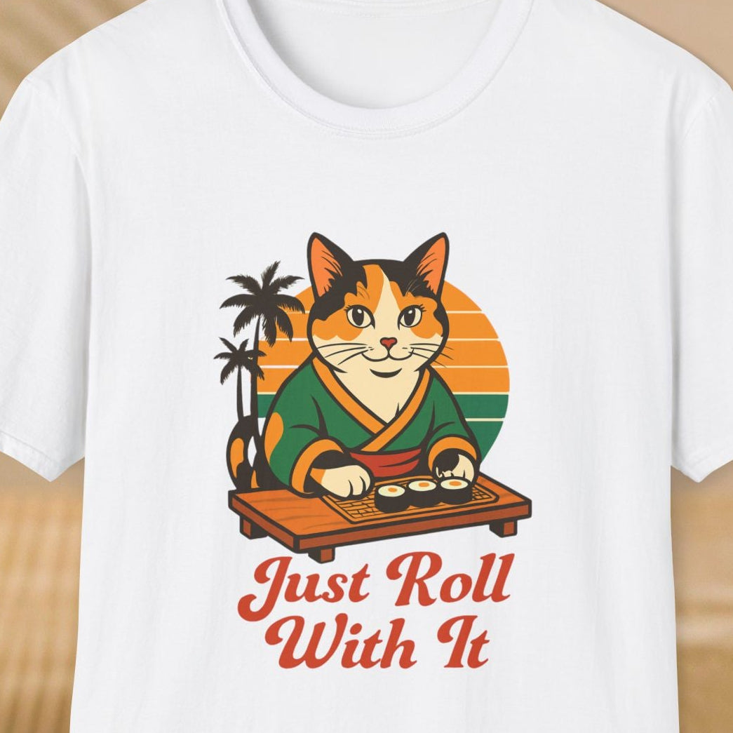 White t-shirt with a cat graphic and 'Just Roll With It' text on a beige background