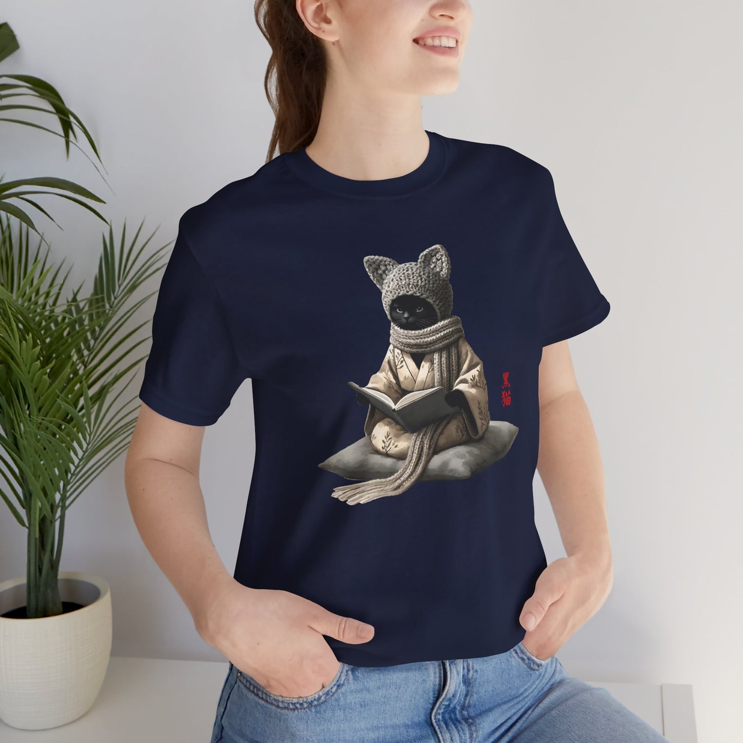 Cozy Bookish Crochet Cat Tee – Unisex