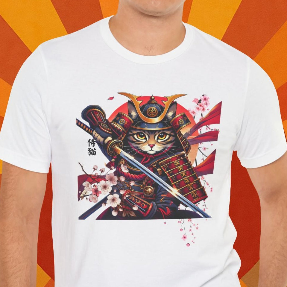Man wearing a white t-shirt with a cat samurai design on an orange and brown background with cherry blossoms.